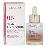 クラランス  Tinted Oleo Serum Healthy Glow & Nourishing Tint Liquid Foundation - # 06   30ml/1oz